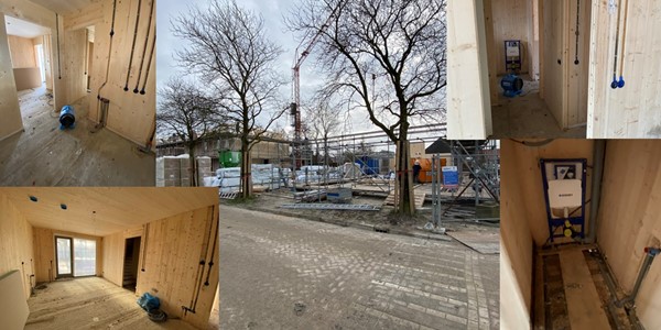 Vergrootbare afbeelding:  + Wanden plaatsen voor de nieuwe woningen in de Ruyterstraat